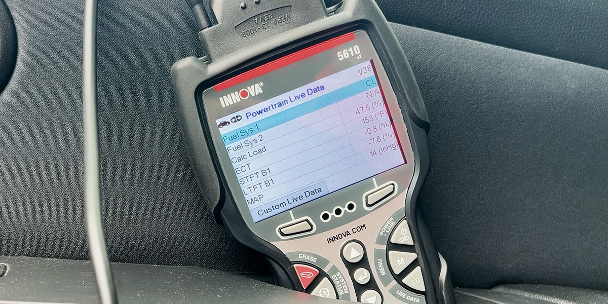 Closeup of Innova Bidirectional Scan Tool inside car Closeup of Innova Bidirectional Scan Tool inside car