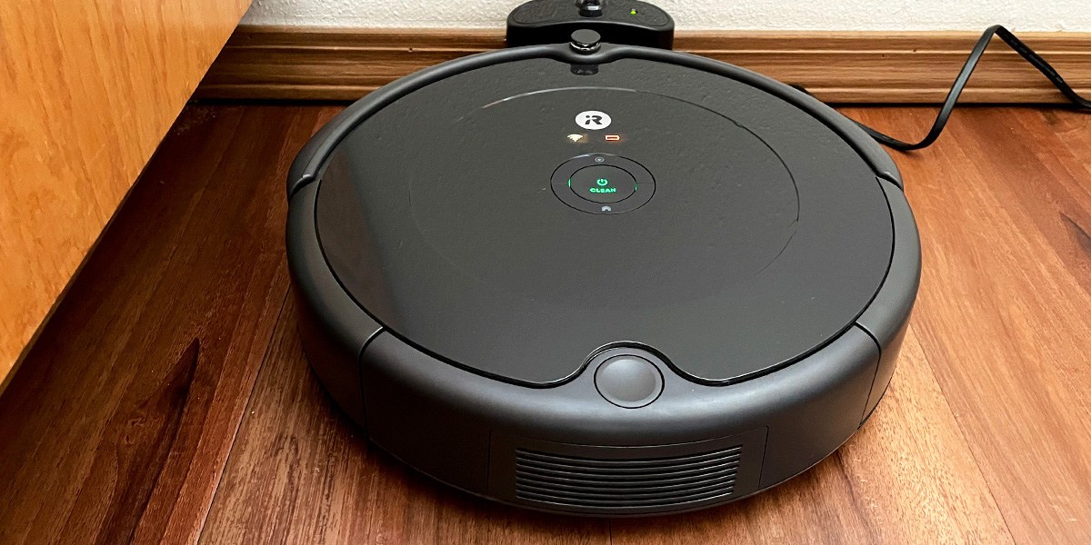 Roomba 694 on charging dock.