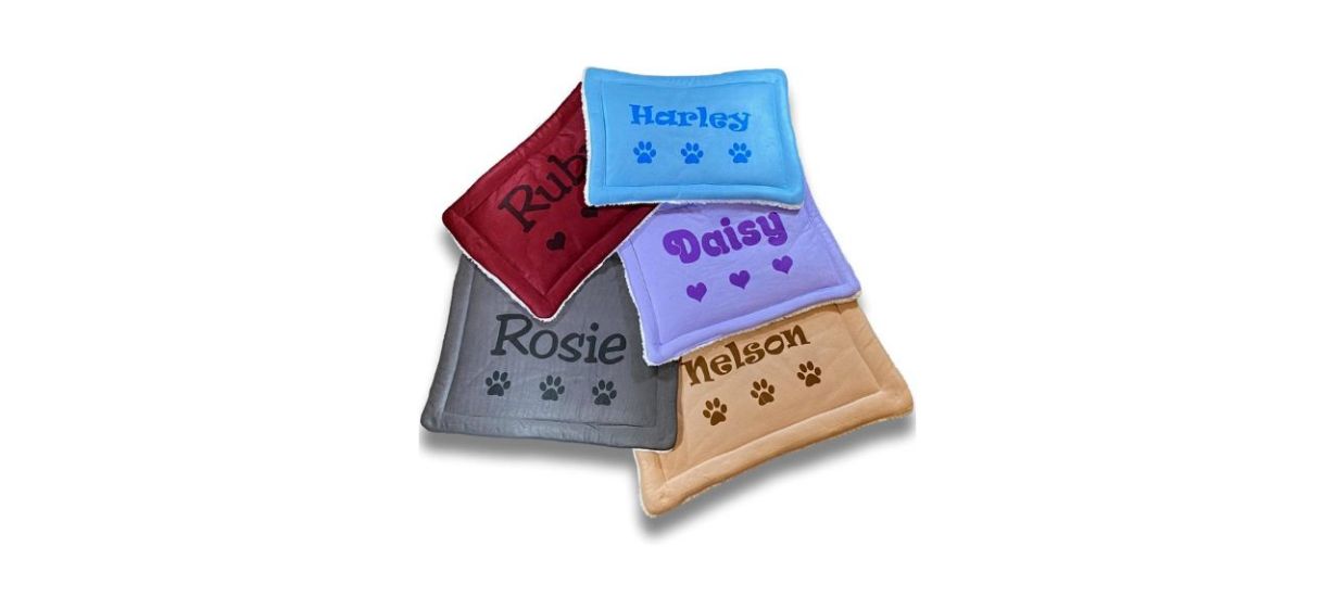 Custom Catch Personalized Dog Mat in red, gray, blue, purple and tan, each with a dog's name on it