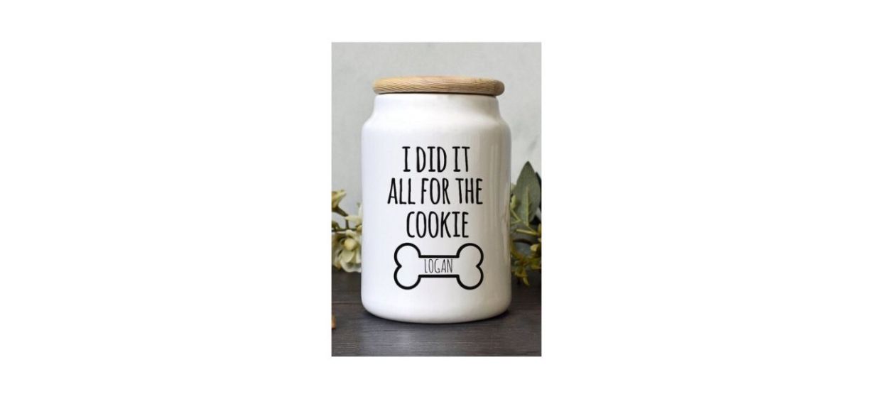 white ceramic dog treat jar that says, &quot;I did it all for the cookie&quot; with a bone design where you can put your dog's name