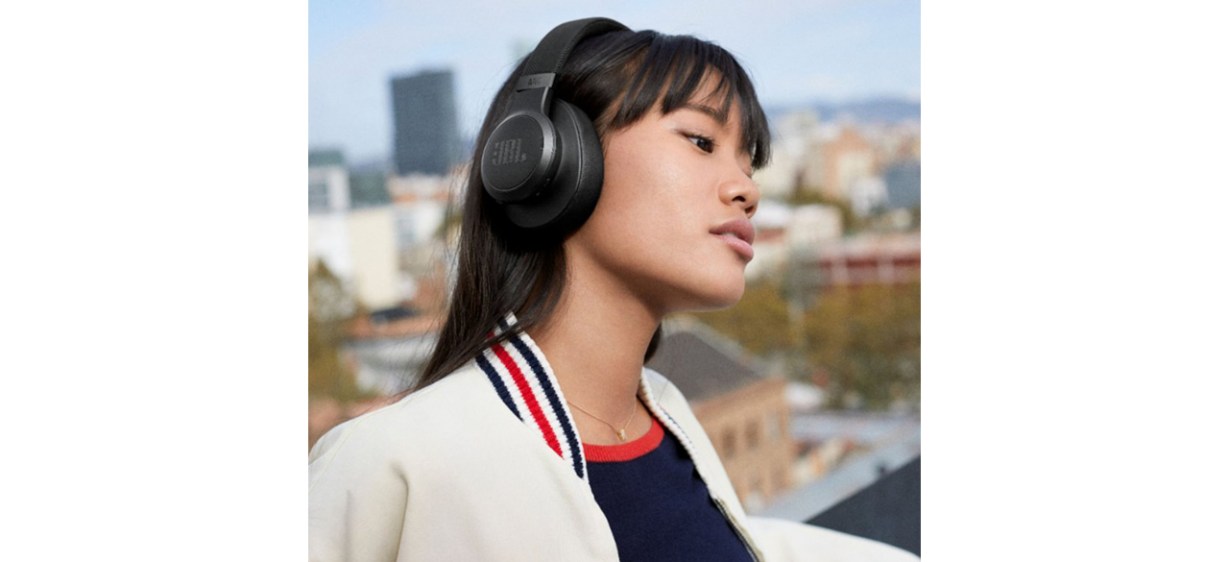 Person wearing JBL Live 660NC Wireless Noise-Canceling Over-The-Ear Headphones