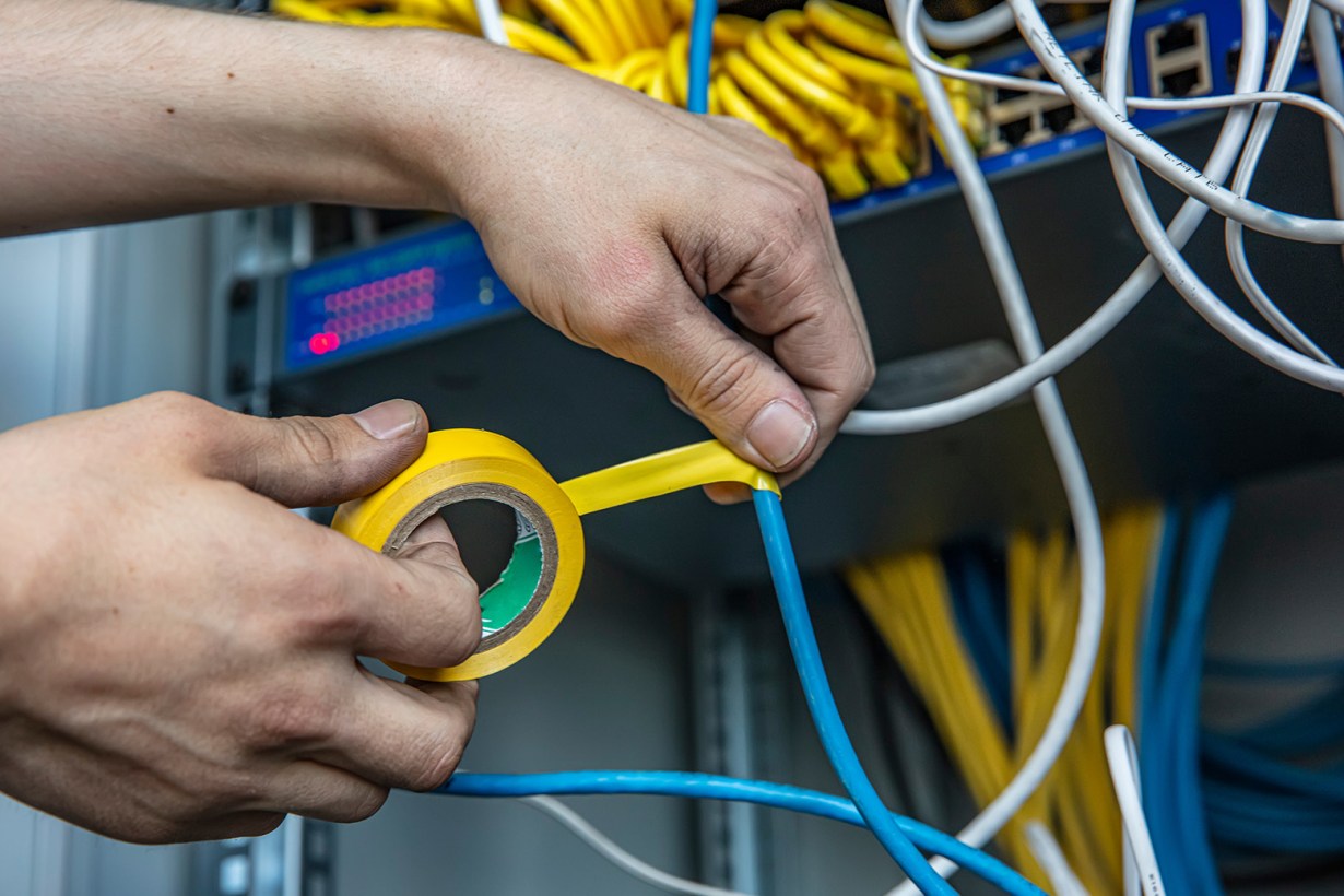 hans using electrical tape