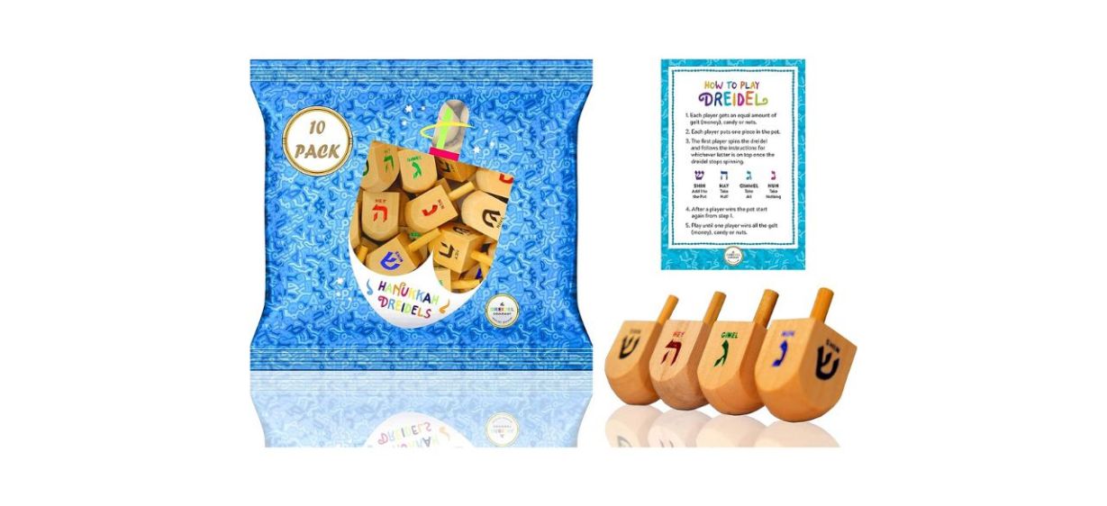 The Dreidel Company Wood Dreidels (10-pack) shown with game instructions