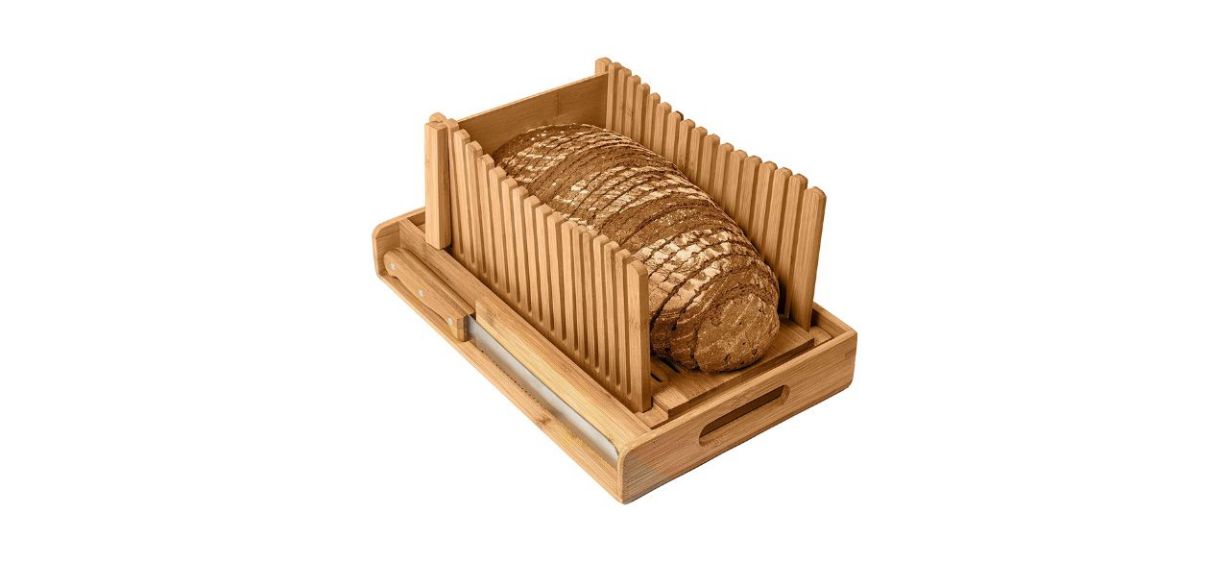 https://cdn14.bestreviews.com/images/v4desktop/image-full-page-cb/kitchen-seven-bamboo-bread-slicer-with-crumb-tray-a097bd.jpg?p=w1228
