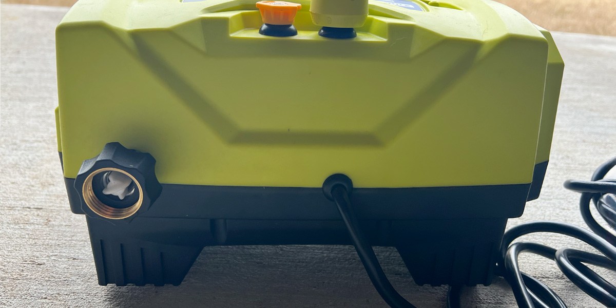 Closeup image of Ryobi 1800 psi Pressure Washer on pavement